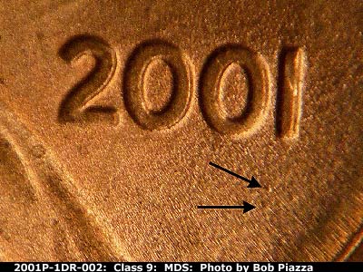 Die-stage B marker on 2001P•1DR•002 (2001 Doubled Die Reverse).