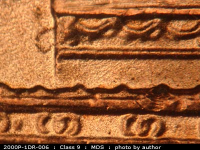 Die-stage B marker on 2001P•1DR•003 (2001 Doubled Die Reverse).
