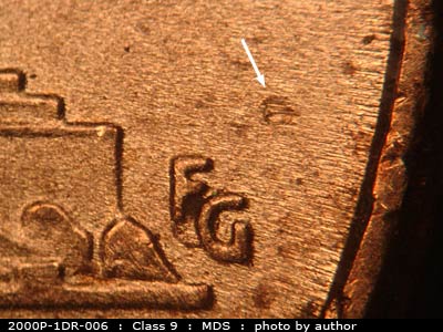 Die-stage B marker on 2001P•1DR•003 (2001 Doubled Die Reverse).