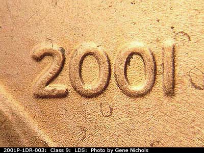 Die-stage C marker on 2001P•1DR•003 (2001 Doubled Die Reverse).