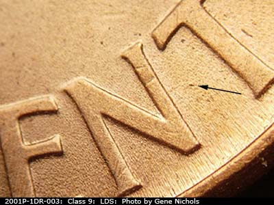 Die-stage C marker on 2001P•1DR•003 (2001 Doubled Die Reverse).