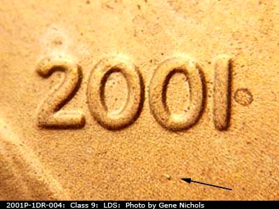 Die-stage C marker on 2001P•1DR•004 (2001 Doubled Die Reverse).