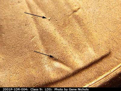 Die-stage C marker on 2001P•1DR•004 (2001 Doubled Die Reverse).