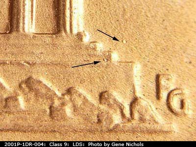Die-stage C marker on 2001P•1DR•004 (2001 Doubled Die Reverse).