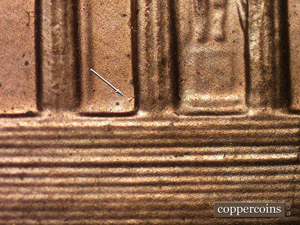 Die-stage B marker on 2001P•1DR•005 showing Die dot in lower bay 5.