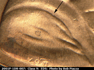 Die-stage A marker on 2001P•1DR•007 (2001 Doubled Die Reverse).
