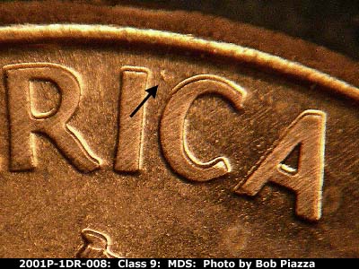 Die-stage B marker on 2001P•1DR•008 (2001 Doubled Die Reverse).