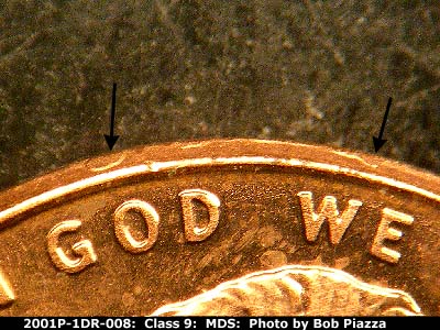 Die-stage B marker on 2001P•1DR•008 (2001 Doubled Die Reverse).