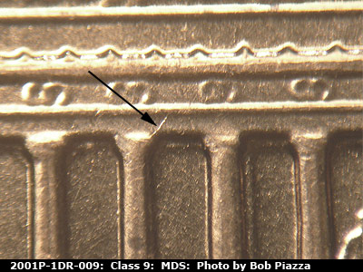 Die-stage B marker on 2001P•1DR•009 (2001 Doubled Die Reverse).