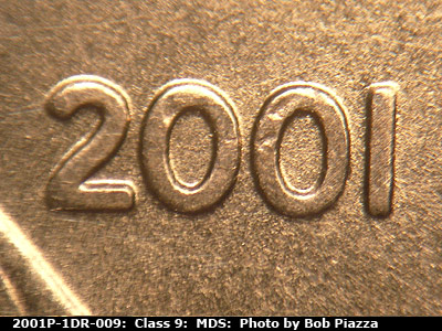 Die-stage B marker on 2001P•1DR•009 (2001 Doubled Die Reverse).