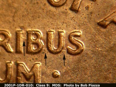 Die-stage B marker on 2001P•1DR•010 (2001 Doubled Die Reverse).