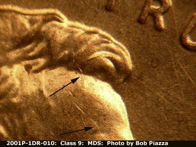 Die-stage B marker on 2001P•1DR•010 (2001 Doubled Die Reverse).