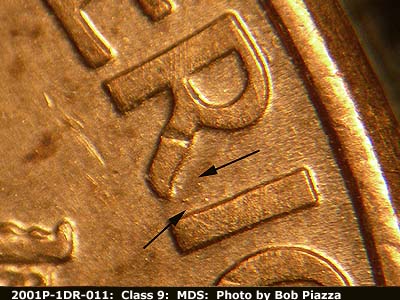 Die-stage B marker on 2001P•1DR•011 (2001 Doubled Die Reverse).