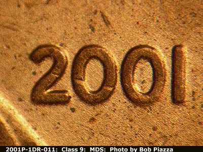 Die-stage B marker on 2001P•1DR•011 (2001 Doubled Die Reverse).