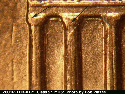 Die-stage B marker on 2001P•1DR•012 (2001 Doubled Die Reverse).