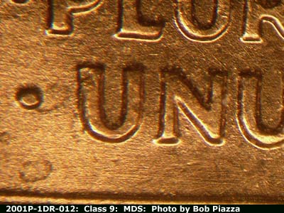 Die-stage B marker on 2001P•1DR•012 (2001 Doubled Die Reverse).