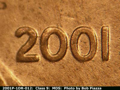 Die-stage B marker on 2001P•1DR•012 (2001 Doubled Die Reverse).