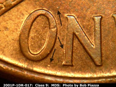 Die-stage B marker on 2001P•1DR•017 (2001 Doubled Die Reverse).