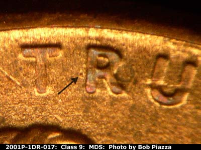 Die-stage B marker on 2001P•1DR•017 (2001 Doubled Die Reverse).