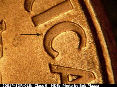 Die-stage B marker on 2001P•1DR•018 (2001 Doubled Die Reverse).