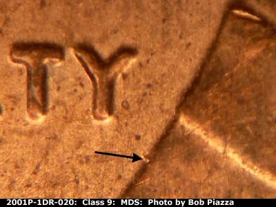 Die-stage B marker on 2001P•1DR•020 (2001 Doubled Die Reverse).