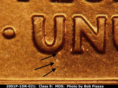 Die-stage B marker on 2001P•1DR•021 (2001 Doubled Die Reverse).