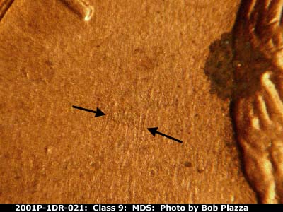 Die-stage B marker on 2001P•1DR•021 (2001 Doubled Die Reverse).