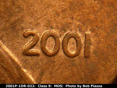 Die-stage B marker on 2001P•1DR•022 (2001 Doubled Die Reverse).
