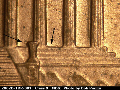 Die-stage B marker on 2002D•1DR•001 (2002 Doubled Die Reverse).