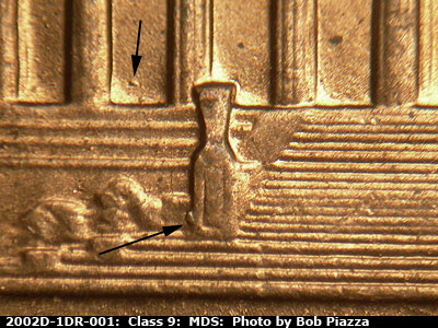 Die-stage B marker on 2002D•1DR•001 (2002 Doubled Die Reverse).