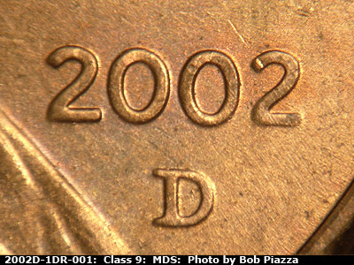 Die-stage B marker on 2002D•1DR•001 (2002 Doubled Die Reverse).