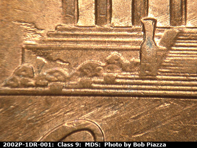 Die-stage B marker on 2002P•1DR•001 (2002 Doubled Die Reverse).
