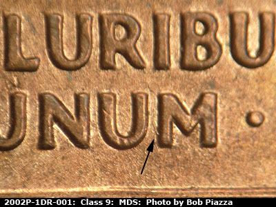 Die-stage B marker on 2002P•1DR•001 (2002 Doubled Die Reverse).