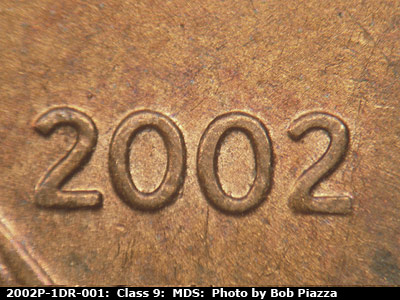Die-stage B marker on 2002P•1DR•001 (2002 Doubled Die Reverse).