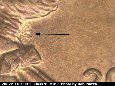 Die-stage B marker on 2002P•1DR•001 (2002 Doubled Die Reverse).