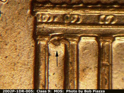 Die-stage B marker on 2002P•1DR•005 (2002 Doubled Die Reverse).