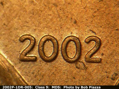 Die-stage B marker on 2002P•1DR•005 (2002 Doubled Die Reverse).