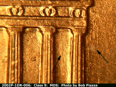 Die-stage B marker on 2002P•1DR•006 (2002 Doubled Die Reverse).