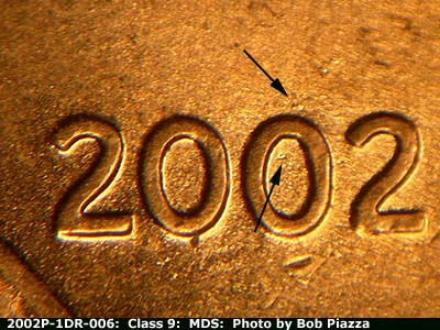 Die-stage B marker on 2002P•1DR•006 (2002 Doubled Die Reverse).