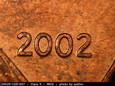 Die-stage B marker on 2002P•1DR•007 (2002 Doubled Die Reverse).