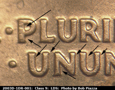 Die-stage C marker on 2003D•1DR•001 (2003 Doubled Die Reverse).