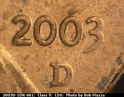 Die-stage C marker on 2003D•1DR•001 (2003 Doubled Die Reverse).