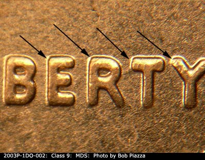 Die-stage B marker on 2003P•1DO•002 (2003 Doubled Die Obverse).