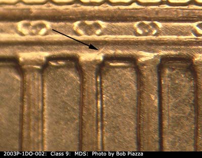 Die-stage B marker on 2003P•1DO•002 (2003 Doubled Die Obverse).