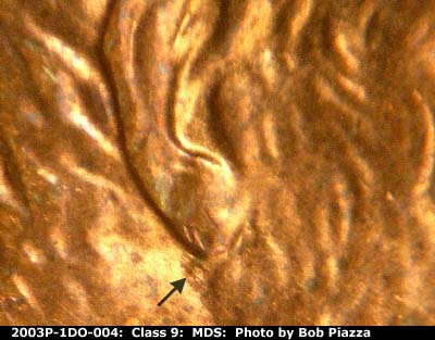Die-stage B marker on 2003P•1DO•004 (2003 Doubled Die Obverse).