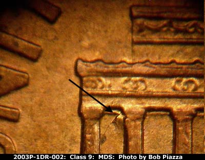 Die-stage B marker on 2003P•1DR•002 (2003 Doubled Die Reverse).