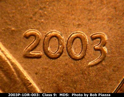 Die-stage B marker on 2003P•1DR•003 (2003 Doubled Die Reverse).