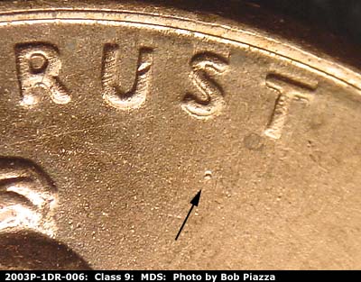 Die-stage B marker on 2003P•1DR•006 (2003 Doubled Die Reverse).