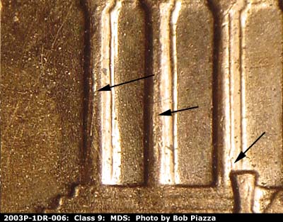 Die-stage B marker on 2003P•1DR•006 (2003 Doubled Die Reverse).