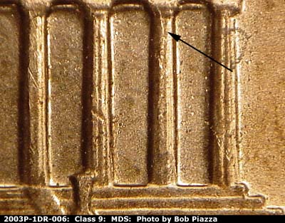 Die-stage B marker on 2003P•1DR•006 (2003 Doubled Die Reverse).